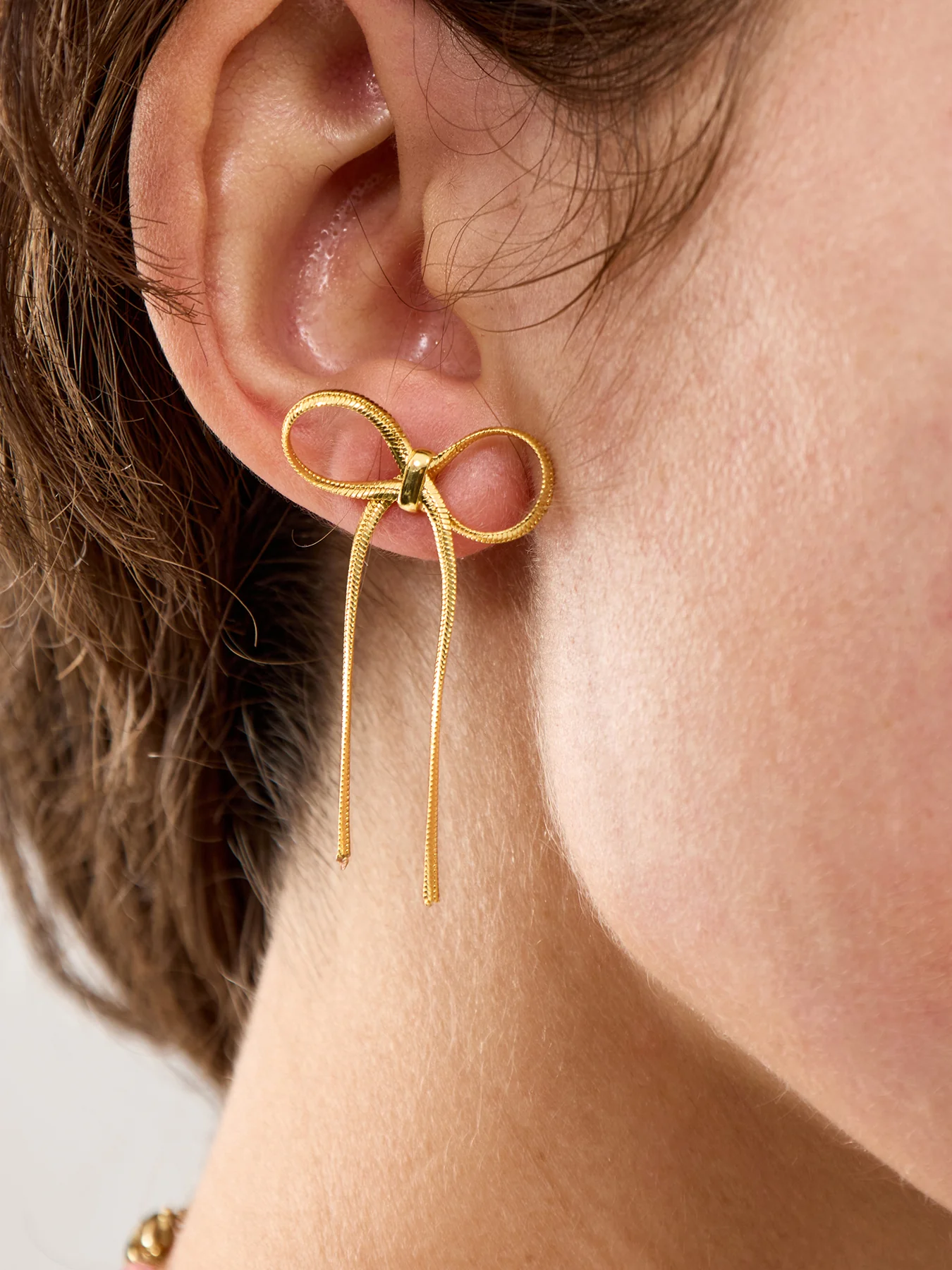 Bow Snake Chain Stud Earrings Gold - Image 2